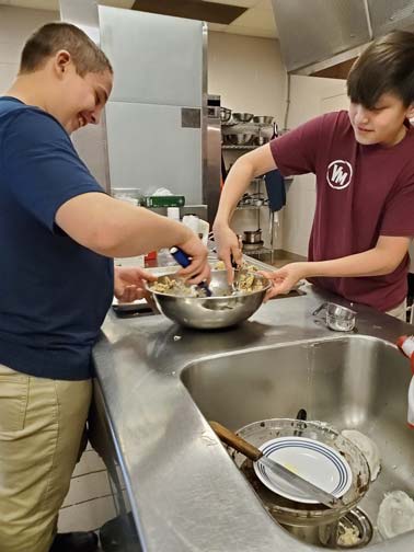 students working together in the kitchen